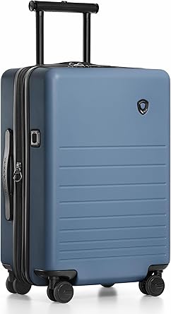 ترافيلرز شويس شنطة امتعة قابلة للتوسيع بجوانب صلبة وعجلات دوارة مزدوجة من ماركهام، شنطة سفر محمولة مقاس 21 انش، قفل تي اس ايه، 21 انش